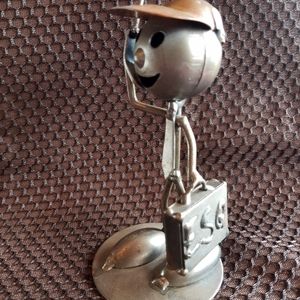 Metal and Copper rustic sculpture - esq,  business